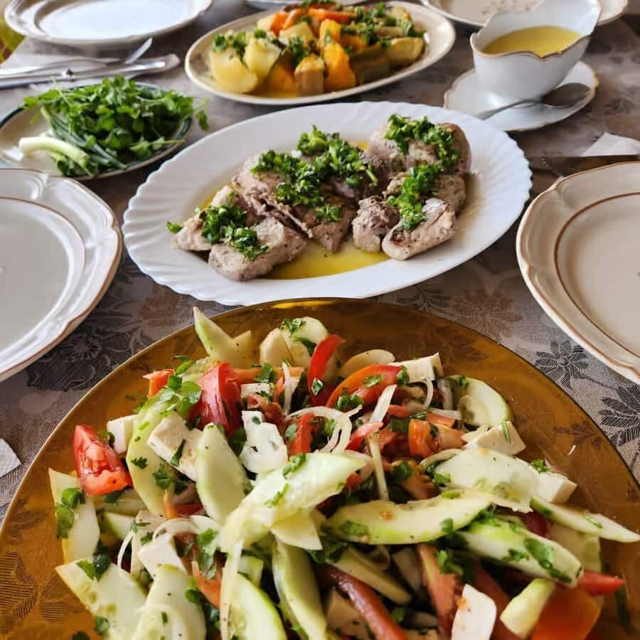 Selecting authentic island spices, hominy, and fresh ingredients